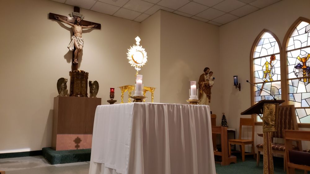 Adoration event with glowing candles